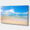 Designart - Large Clouds Over Calm Beach - Seashore Photo Canvas Print